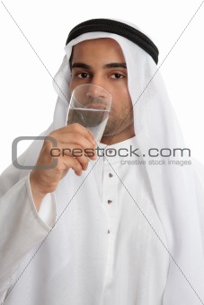 Arab man drinking pure fresh water