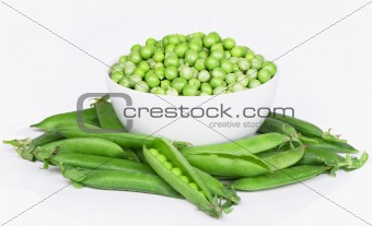 Bowl with green peas the isolated on white background