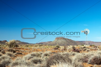 Wonderful landscape with mountains and wind-mill in Africa