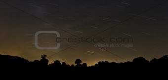 Long exposure photo of night sky with stars trail