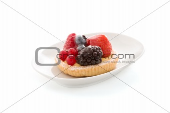 Pastry with berries on white background