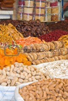 Colorful dried fruits and nuts focus on figs