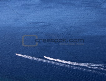 Two boats on blue sea