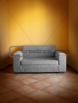Gray sofa yellow wall