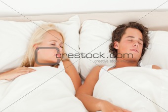 Peaceful couple sleeping