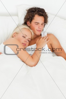 Portrait of a couple sleeping