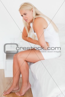 Portrait of a woman having a stomachache