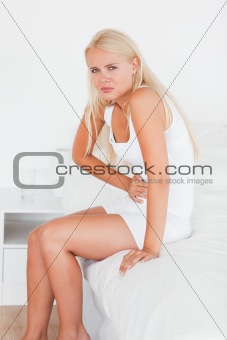 Portrait of a sick woman having a stomachache