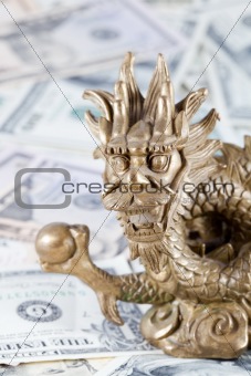 Gold dragon against dollars