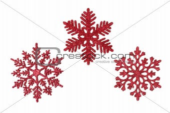 Three red glitter snowflakes