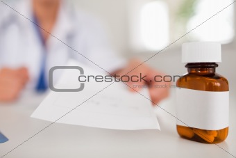 Female doctor showing paper