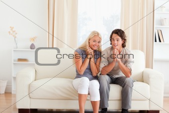 Couple watching a game on TV