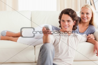 Cute couple watching the television
