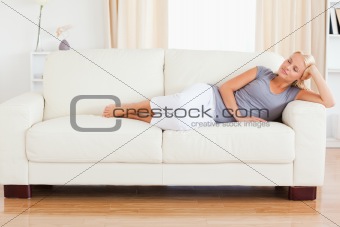 Woman sleeping on a sofa