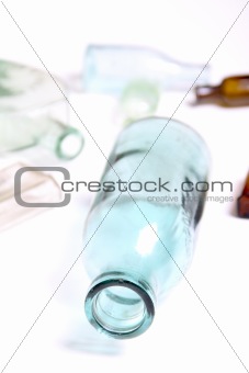Vintage glass bottles on white