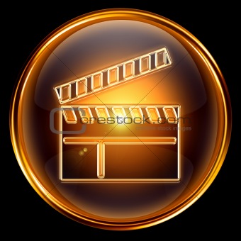 movie clapper board icon golden, isolated on black background.