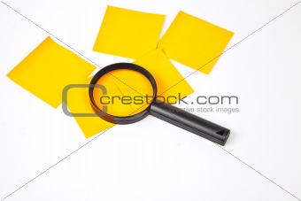 a magnifying glass hovering over the post-it Inspection