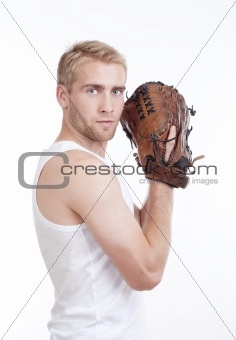 man in white top with baseball glove looking into camera - isolated on white