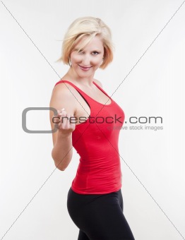 sexy blond girl showing come on gesture looking, smiling - isolated on white