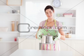 Cute Woman holding a pot