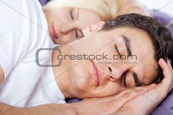 Couple sleeping late
