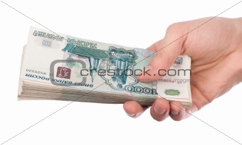 Hand holding a lot of money