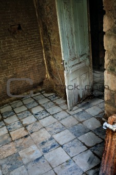 decayed room interior with tiled floor