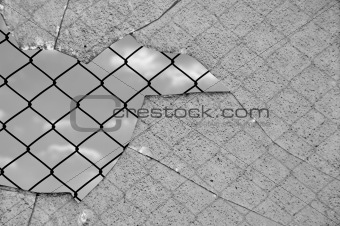 broken glass and wired fence