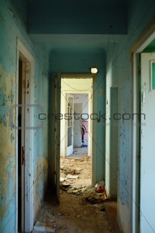 peeling hallway in abandoned building