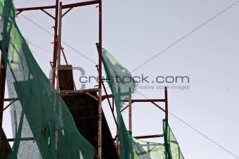 torn debris netting scaffold