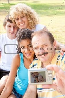 Happy family taking self portrait
