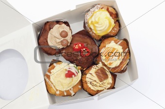 Cupcakes squashed in a box