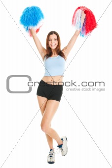 Smiling cheerleader girl posing with pom poms