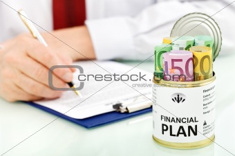 Business man making financial plan - closeup