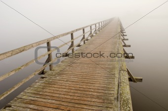wooden brigde  and  morning mist