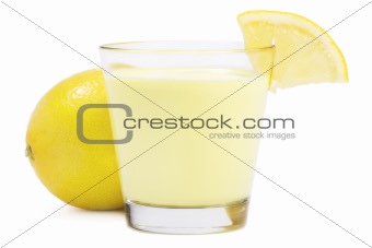 milkshake with a piece of lemon in front of a lemon