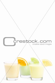 three cold citrus fruit milkshakes