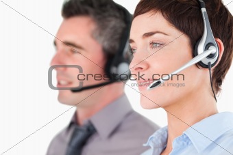 Close up of operators using headsets