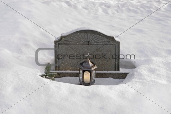 tombstone in snow