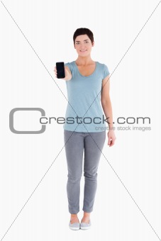 Woman showing a smartphone