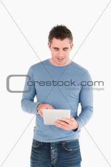 Portrait of a man using a tablet computer