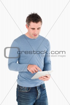 Portrait of a man working with a tablet computer