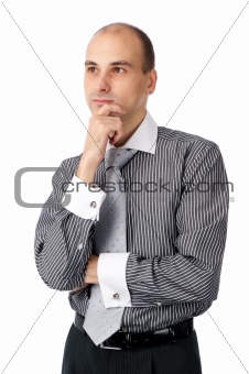 Portrait of handsome young business man looking away