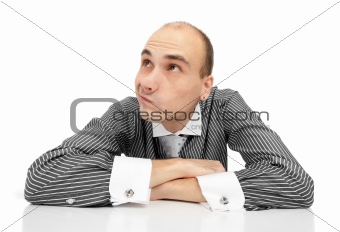Portrait of handsome young thoughtful businessman isolated over 