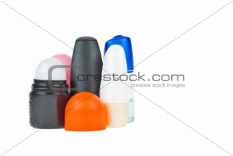 Colorful deodorant on white background