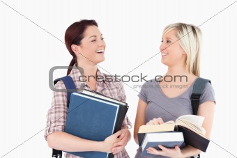 Laughing students looking at each other