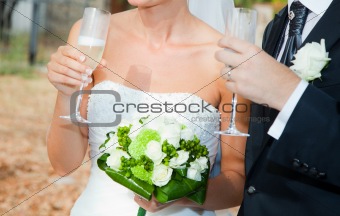 Bride and Groom Drinking a Toast