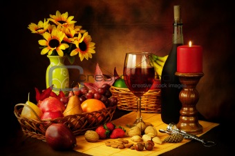 Wine, fruit and nuts still life
