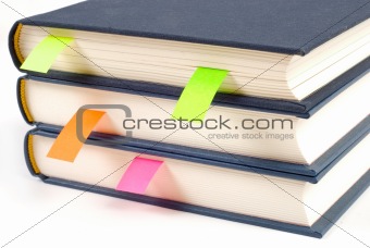 Books with bookmarks isolated on white background