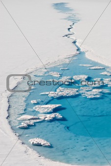 Small blue lake on the glacier - Spitsbergen, Arctic